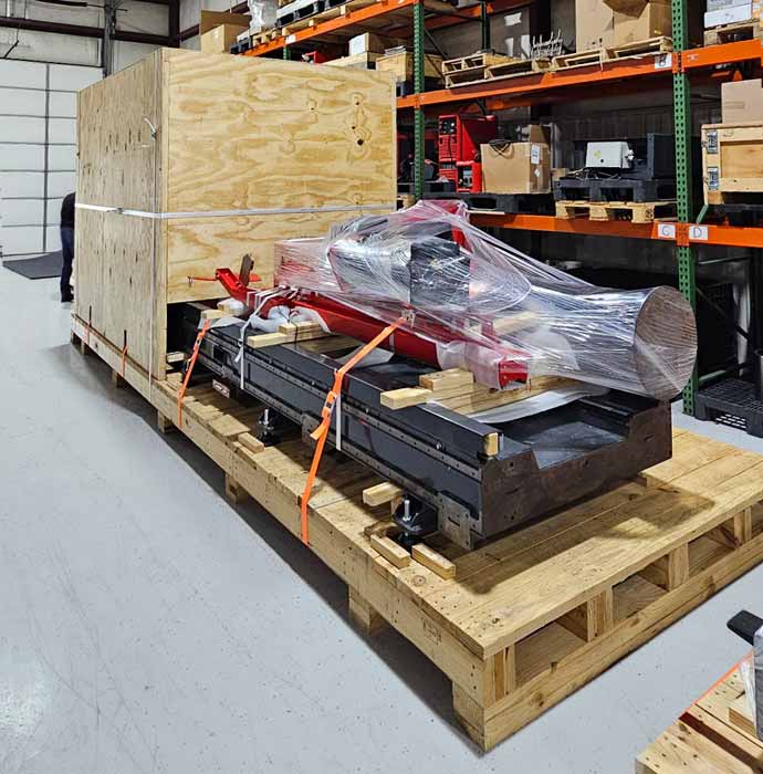 Oil field equipment on skid with hood box crating